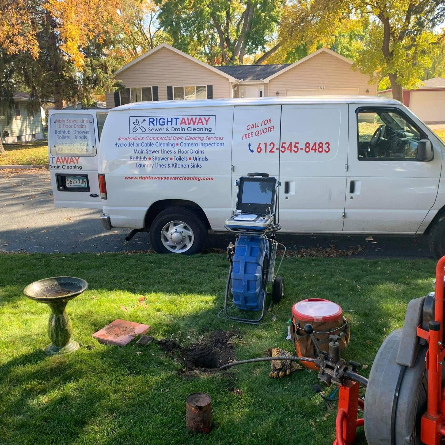 Right Away van parked at a Minneapolis home with a sewer camera and drain machine set up at the outdoor cleanout
